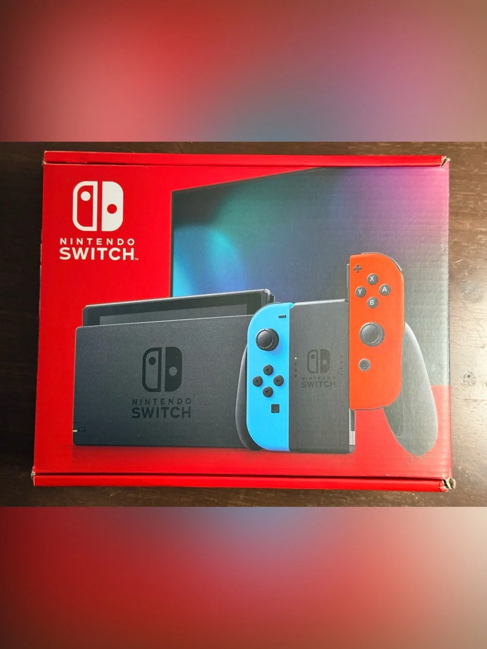 Nintendo Switch with Neon Blue and Neon Red Joy-Con Controllers